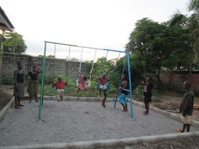 Mercy Children's Home - Playing on the swing
